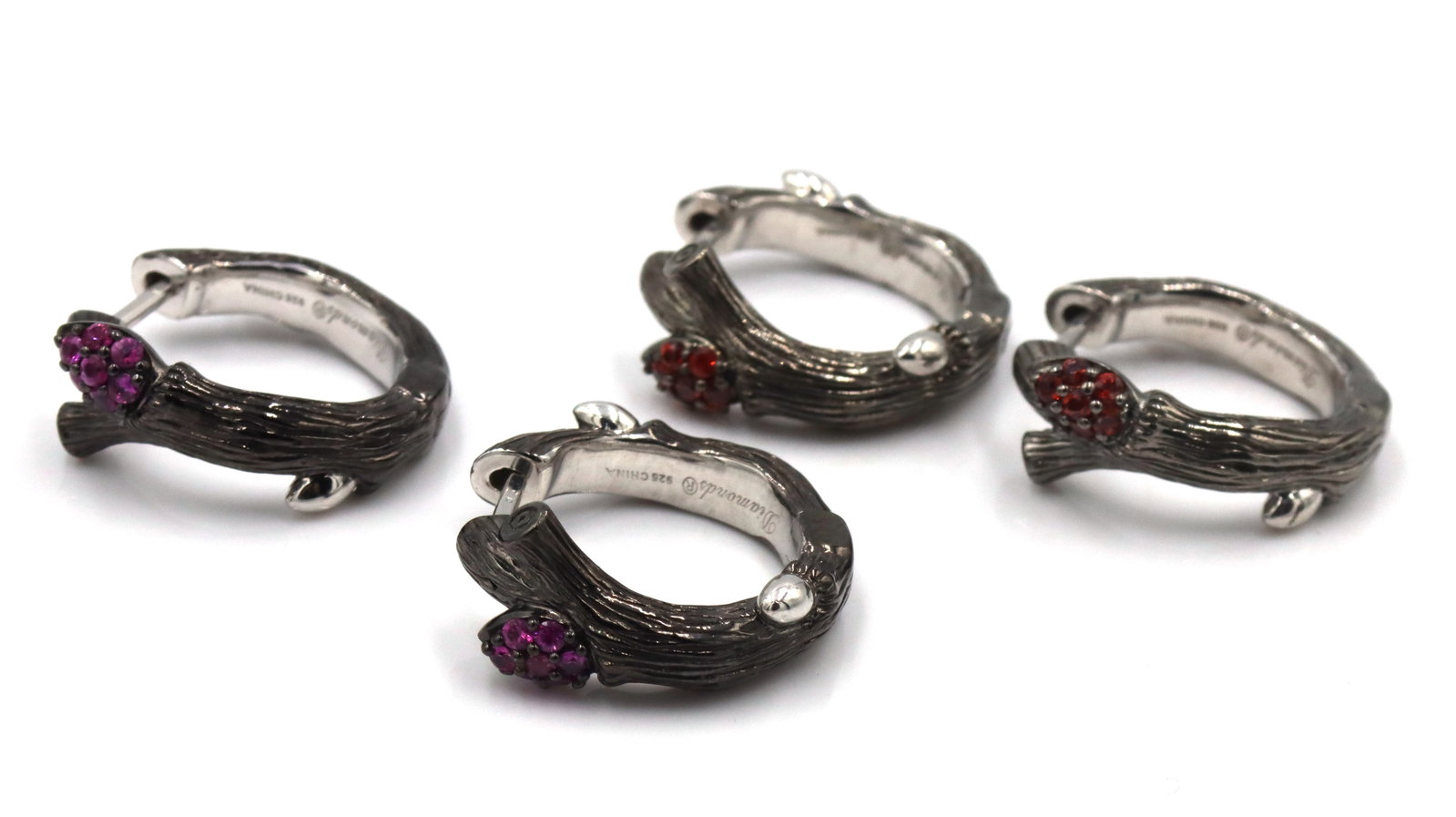 2 Pairs of 925 sterling silver signed hoop earrings: 2 Pairs of 925 sterling silver signed hoop earrings. The total weight of the lot is 19.9 grams.
