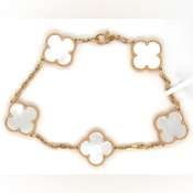 18KT Yellow Gold Mother Of Pearl Bracelet: 18KT Yellow gold Hand Crafted Five Motifs Mother Of Pearl Bracelet. Note: Designer Inspired but not Designer brand. 12 Grams