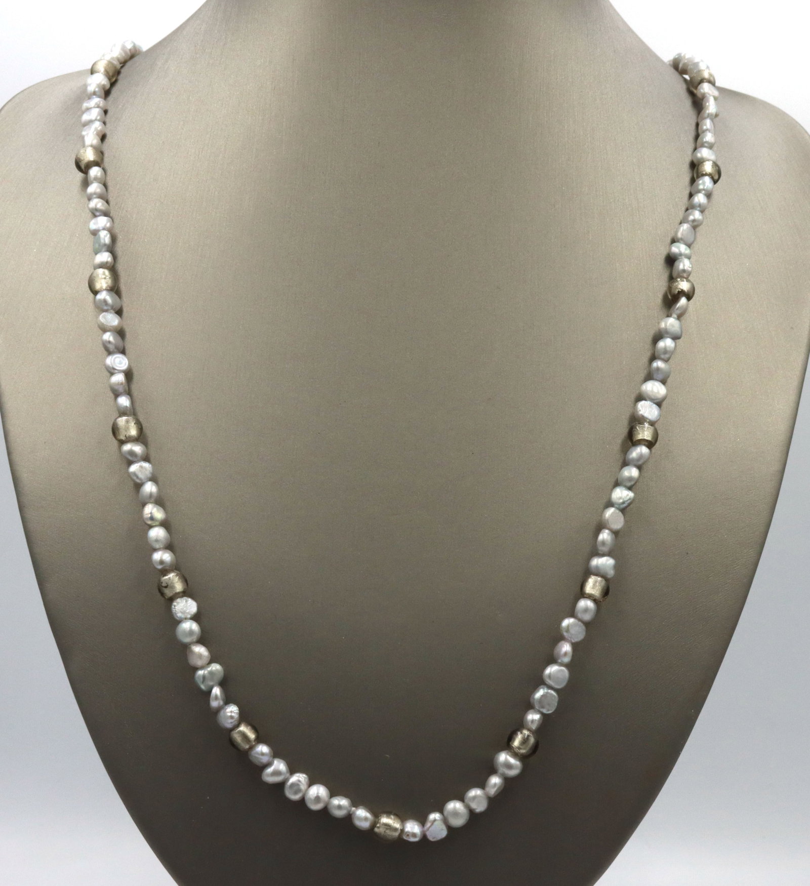 Honora grey pearl stand necklace: Honora grey pearl stand 36-inch necklace with 925 sterling silver. The total weight of the necklace is 32.6 grams.