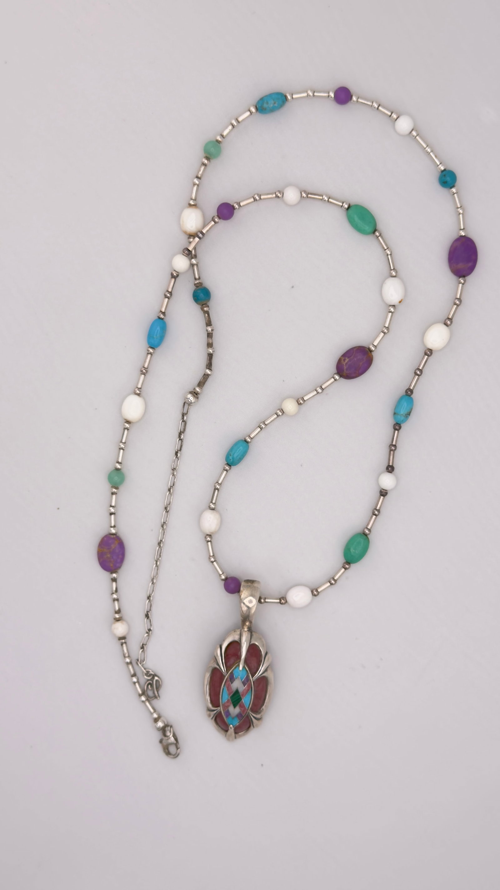 925 Vintage Sterling Silver Carolyn Pollack Inlay of turquoise inlay Carnelian, Amethyst Turquoise P: 925 Sterling Silver vintage Carolyn Pollack inlay carnelian, turquoise, amethyst enhancer with multi-color stone chain necklace. 55.9 grams. Size: 36
