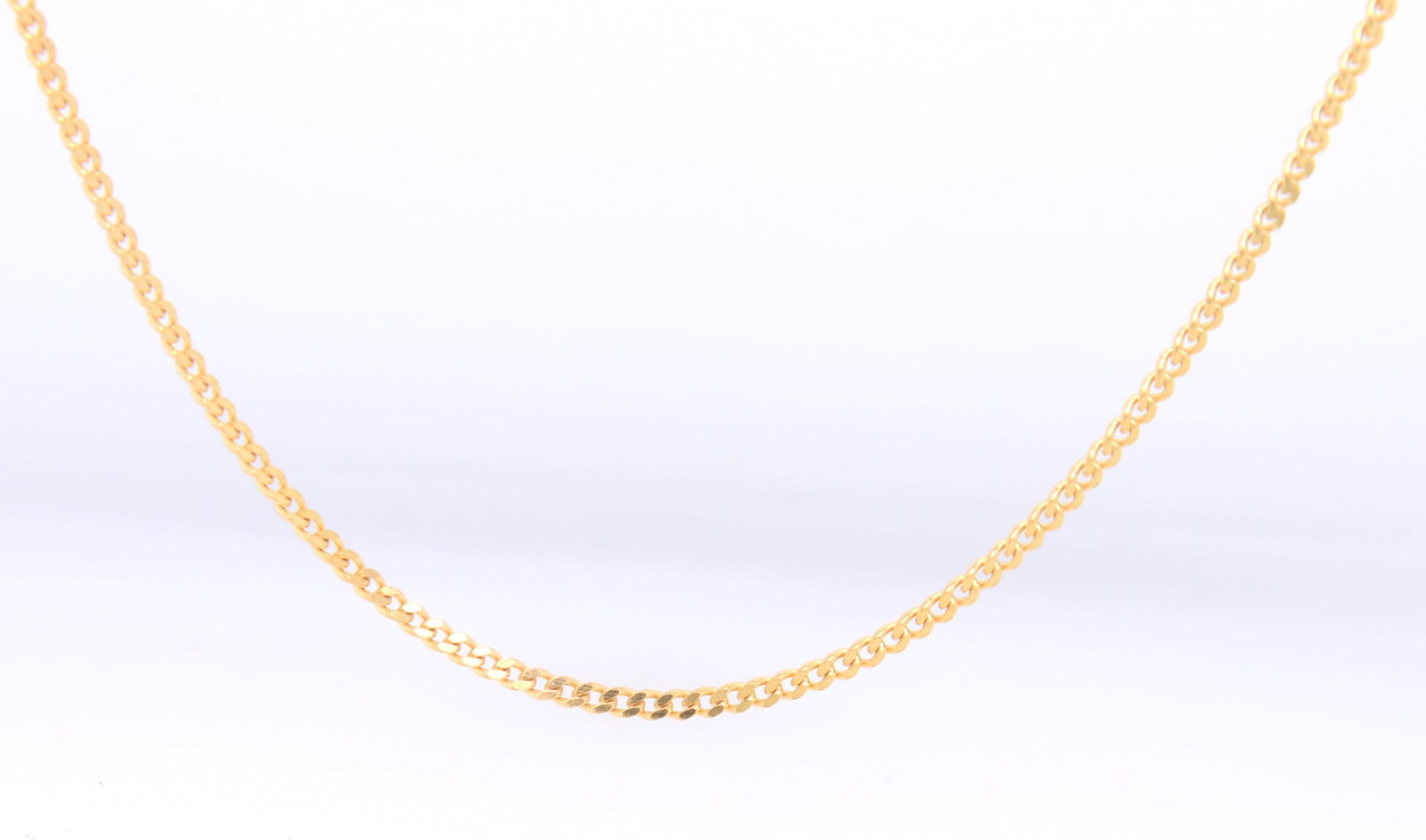 14kt Yellow gold Curb link chain necklace: 14kt Yellow Gold 16 inches Curb Link Chain Necklace. Total weight of Necklace 2.50 Grams