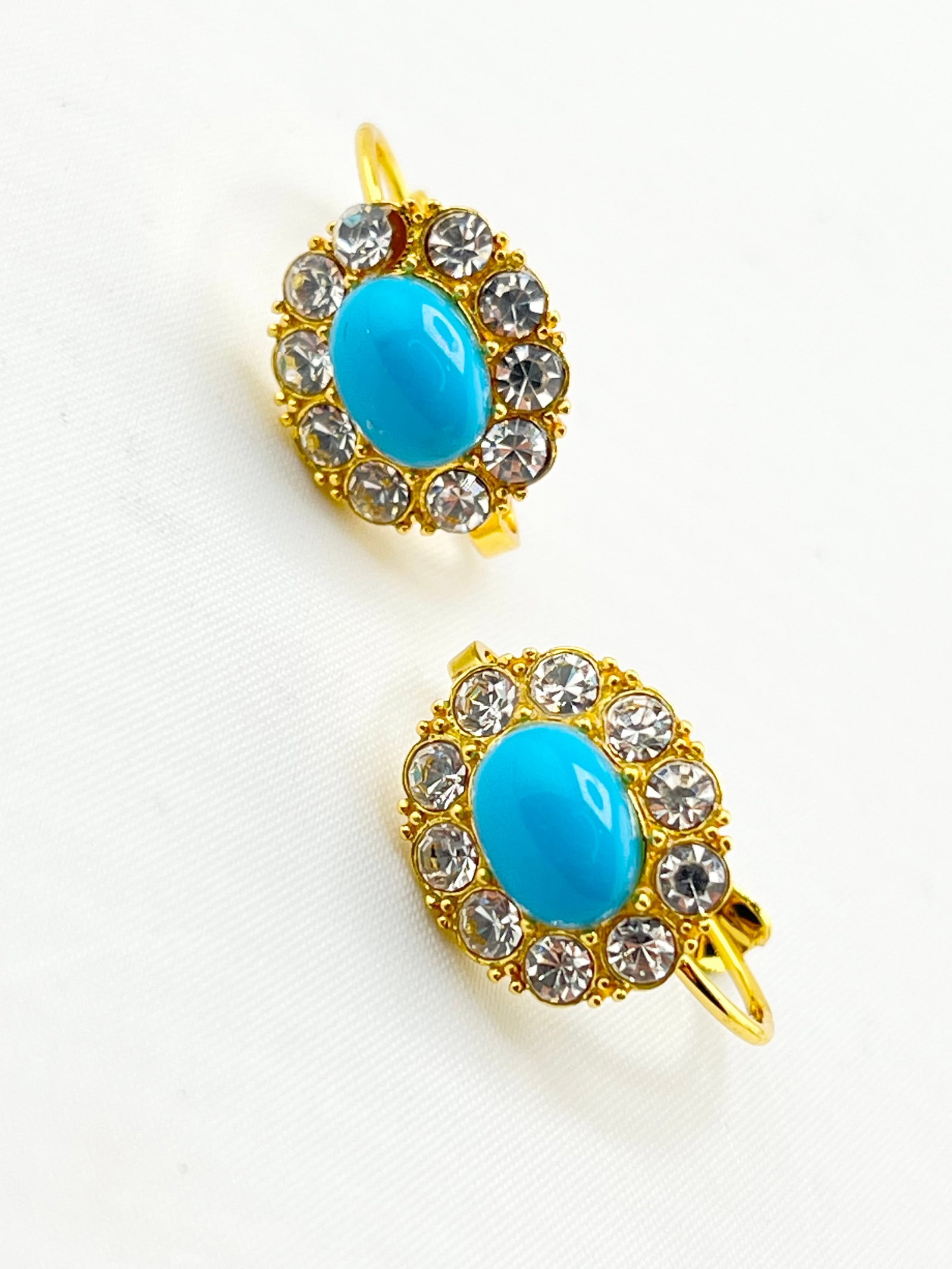 925 Gold Tone Sterling Silver Turquoise Color Stone With Halo Rhinestones Earriungs: 925 Gold Tone Sterling Silver Turquoise Color Stone Surrounded With Halo Rhinestone Earrings. 3.5 grams