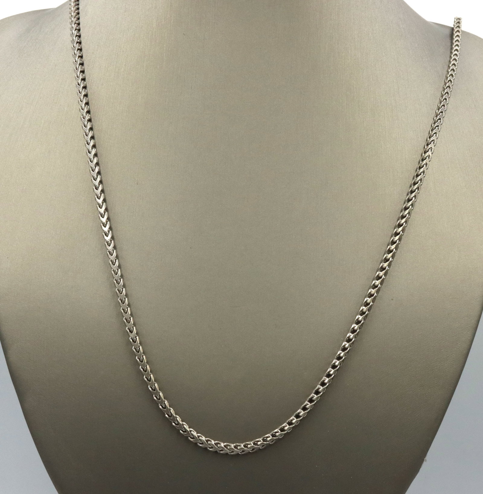 Italian 925 sterling silver chain necklace: Vintage 925 sterling silver bone link 34-inch chain necklace with lobster clasp. The total weight of the necklace is 37.9 grams.