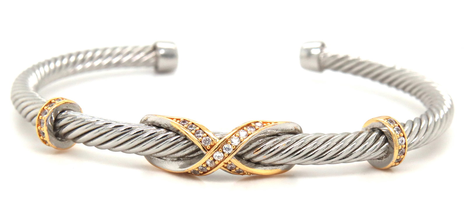 Stainless steel cross over cuff bangle: Stainless steel cross over cuff bangle. The total weight of the bangle is 14.6 grams.