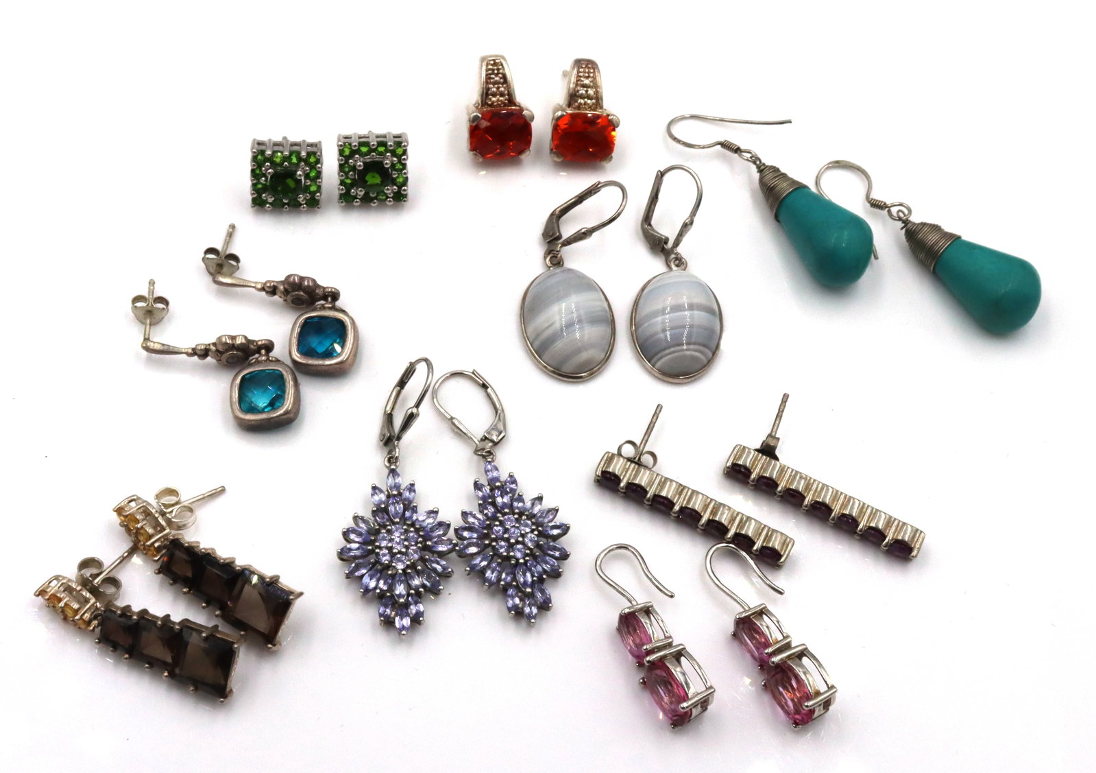 Group lot of Vintage 925 sterling silver earrings: Group lot of Vintage 925 sterling silver earrings. The total weight of the group lot is 50.5 grams.