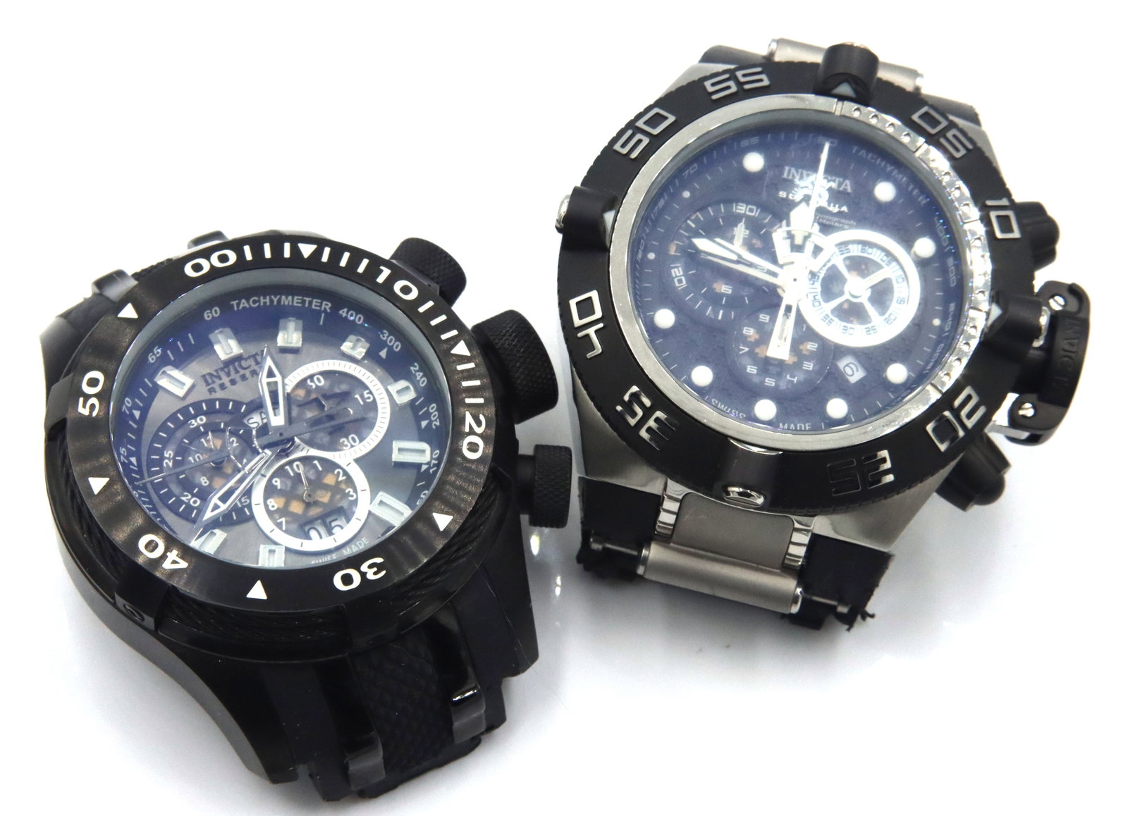 Lot of 2 Invicta watches: Lot of 2 Invicta watches need bands. The total weight of the lot is 394.2 grams.