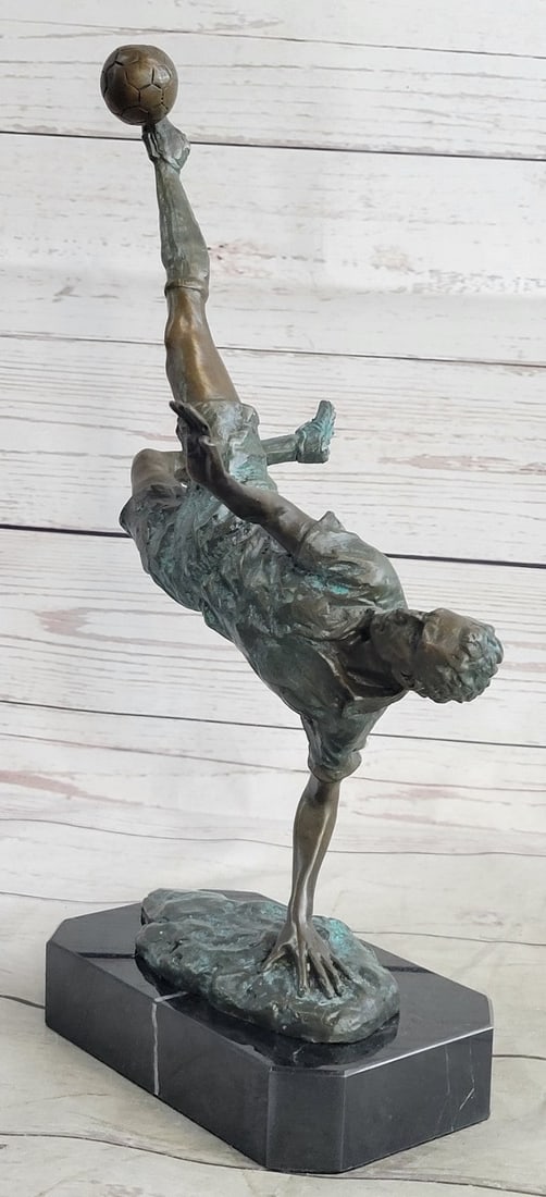 Dynamic Bronze Sculpture of Soccer Player Scoring Goal by Milo Action Artwork: Condition: This sculpture is in perfect condition Bronze Dimensions with Marble Base: Height 13" X Width 9.5" Marble Dimensions:6" X 4" Height without base:12" Weight:7 LBS Inventory:18EPA128C4981 Exp