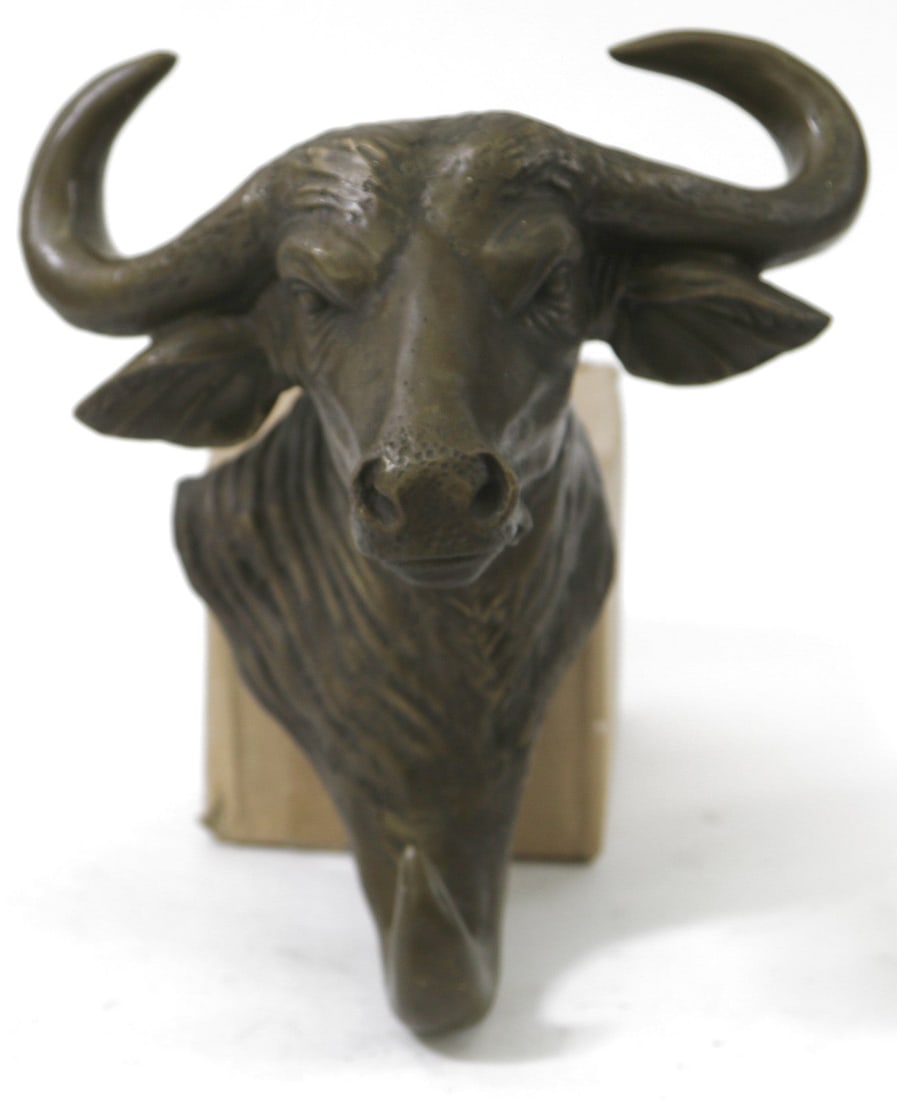 WALL MOUNT BRONZE BULL HEAD , MIGUEL LOPEZ SIGNED . DETAILED SCULPTURE FIGURINE FIGURE: Condition: This sculpture is in a perfect condition. Bronze Dimensions :Height 10" x Width 8" Weight : 5 LBS Inventory : 27FDW1134572 A depiction of the large and mighty Bull Head. The Bull Head Sculp