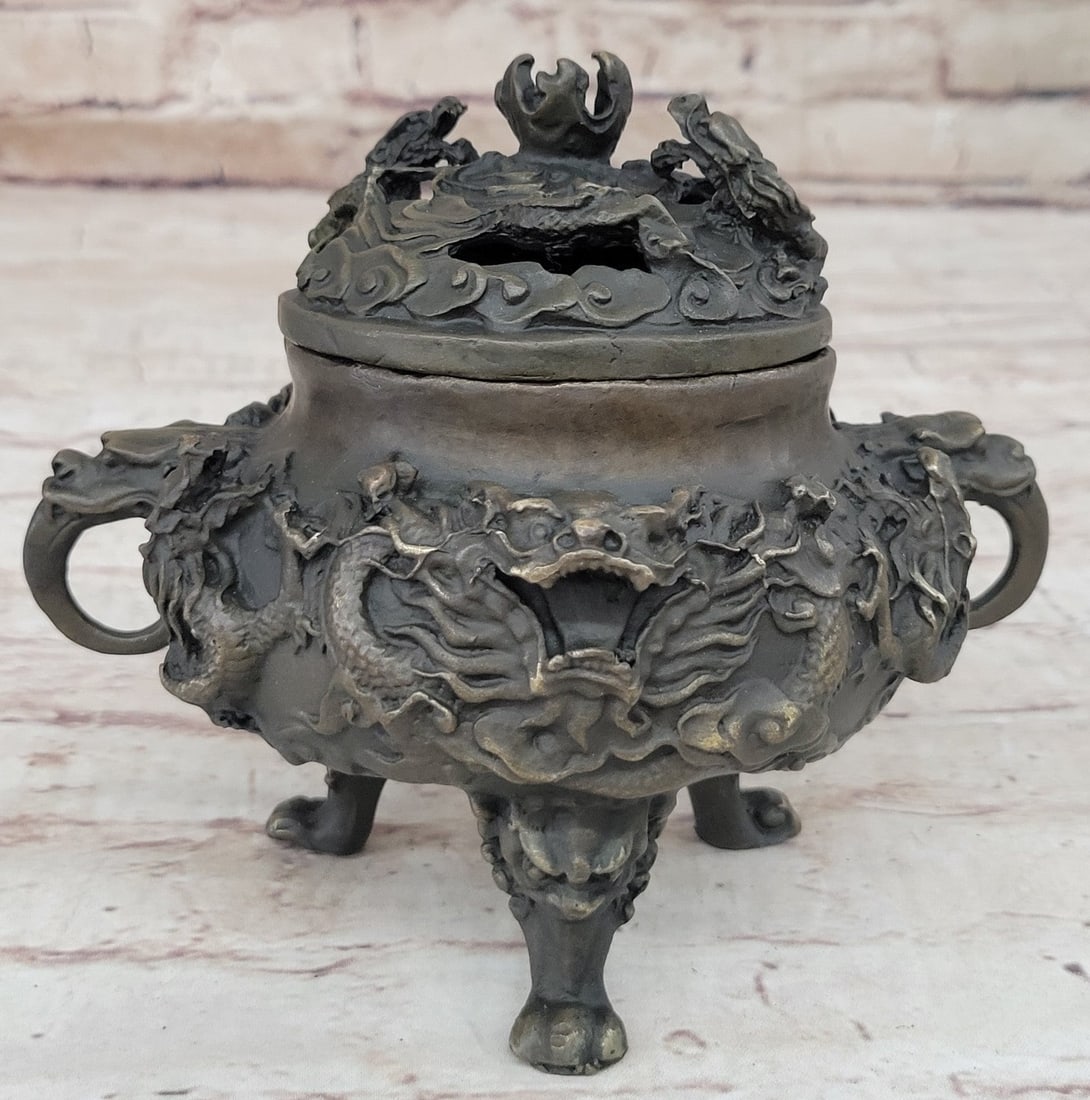 Handcrafted bronze sculpture SALE Incense Dragon Gilded Favorites Folk China: Condition: This sculpture is in perfect condition. Bronze Dimensions Base: Height 6" x Width 7" Weight : 5 LBS Inventory: 74YCN0013547 Step into the realm of fantasy with this captivating bronze sculp
