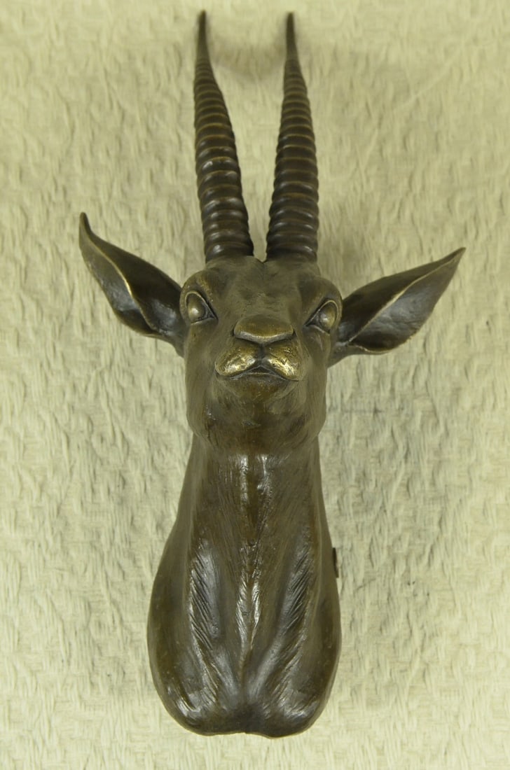 Hot Cast Hand Made Rams Head Bronze Masterpiece Home Office Decoration Figurine: Condition: This sculpture is in perfect condition. Bronze Dimensions :Height 16" x Width 8" Weight : 8 LBS Inventory: 85AL3606458 SALE$ This is bronze Gazelle head wall mount, a hunter`s trophy, of a 