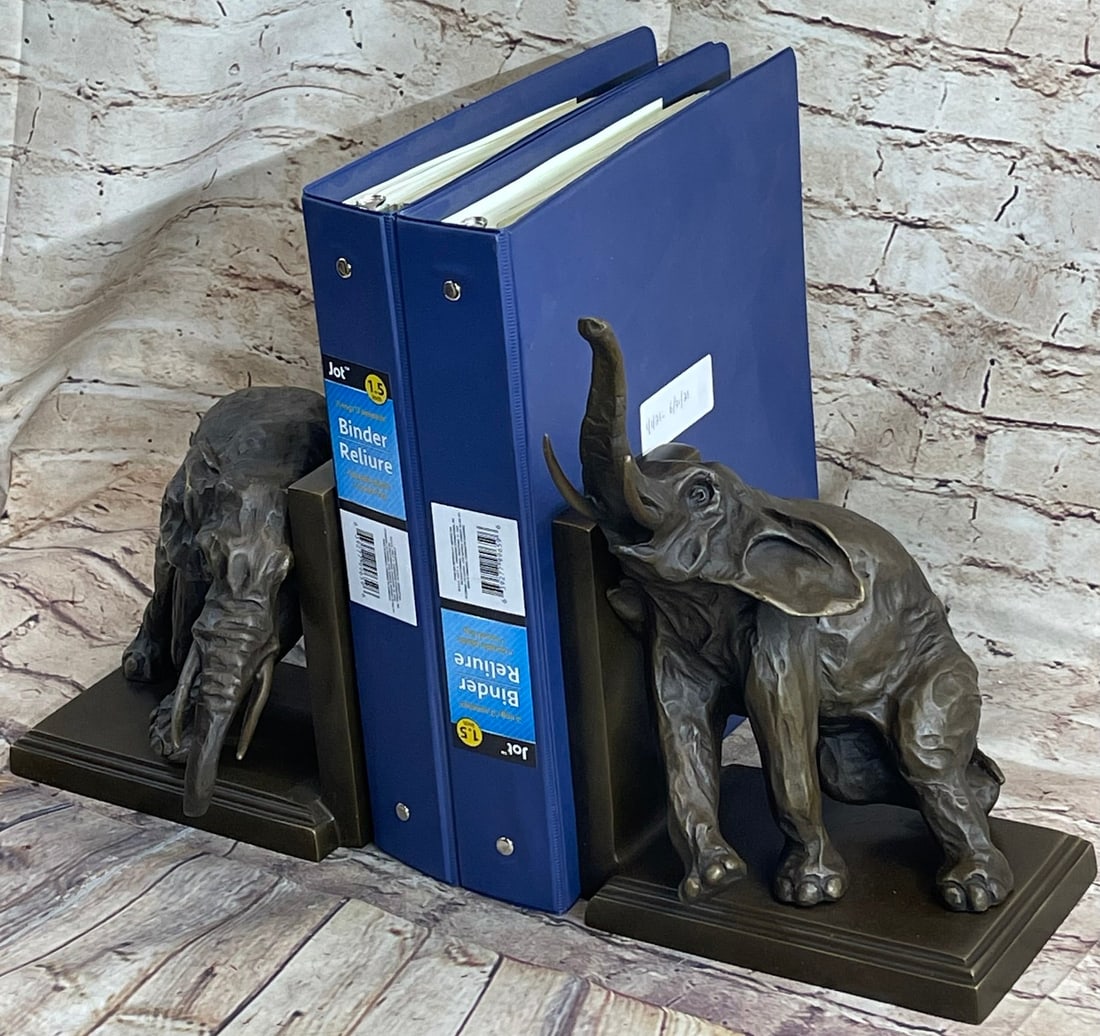 Bronze Statue Book Ends Bookends Sculpture Classic Elephant Elephants Figure: Condition: Both sculpture are in perfect condition. Bronze Dimensions of each sculpture :Height 11" x Width 7" Total Weight :20 LBS Inventory : 69-K142/1439496 Introducing a pair of exquisite bronze b