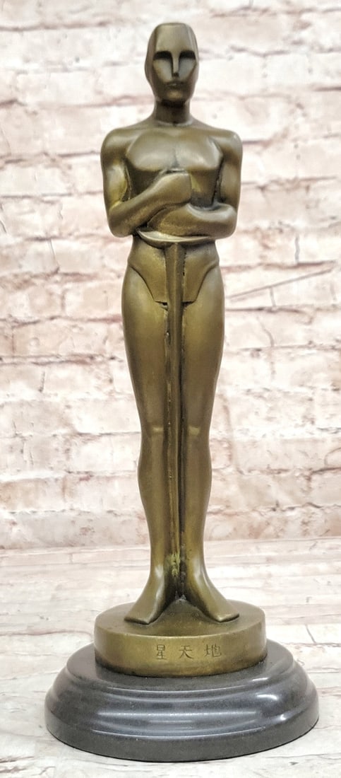 Collectible Real Bronze Oscar Trophy Academy Awards Sculpture: Condition: This sculpture is in perfect condition Bronze Dimensions with marble Base: Height 14" X Width 5" Wood Dimensions: Diameter 5" Height without base:13" Weight:7 LBS Inventory:19YCN0574991 Cel
