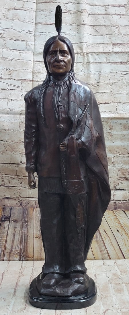 Extra Large Native American Chief Bronze Statue by C.M. Russell Decor: Condition: This sculpture is in perfect condition Bronze Dimensions with Marble Base Height 33.5" X Width 10" Marble Dimensions: Diameter 9" Height without base:32.5" Weight:29 LBS Inventory:311801519