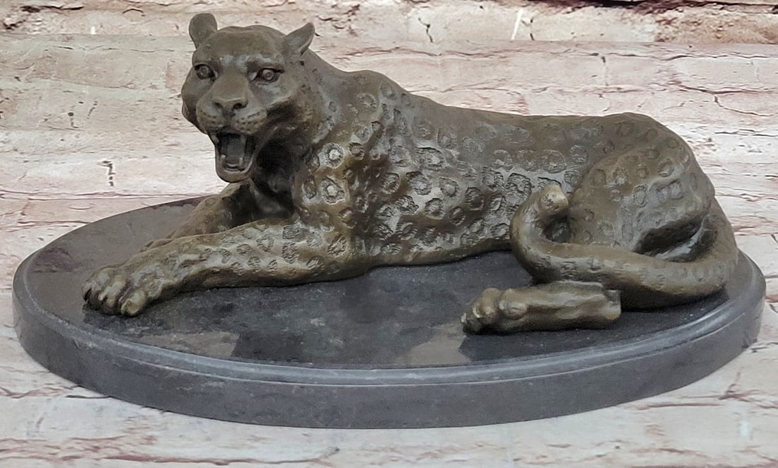Collectible Wildlife Bronze Sculpture - Milo's Signed Jaguar Home Decor: Condition: This sculpture is in perfect condition Bronze Dimensions with Marble Base: Height 5" X Width 9" Marble Dimensions: Diameter 9" Height without base:4" Weight:9 LBS Inventory:63AL06436 In the
