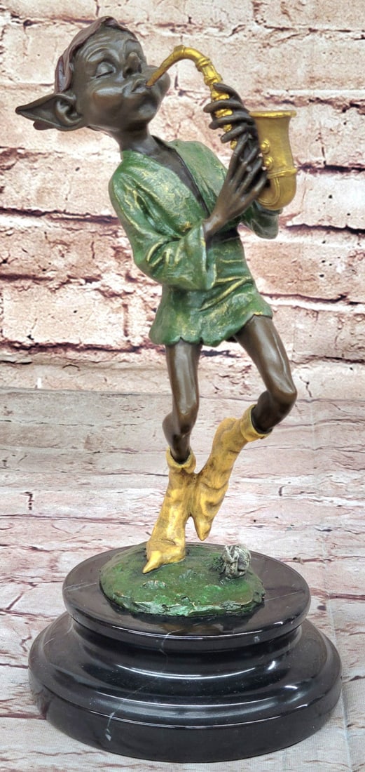 Juno`s Solid Bronze Music Lover Figurine - Collector`s Edition Artwork: Condition: This sculpture is in perfect condition. Bronze Dimensions with Marble Base: Height 10" X Width 5.5" Marble Dimensions: Diameter 4.5" Height without base:9" Weight:6 LBS Inventory:67EP846MC4