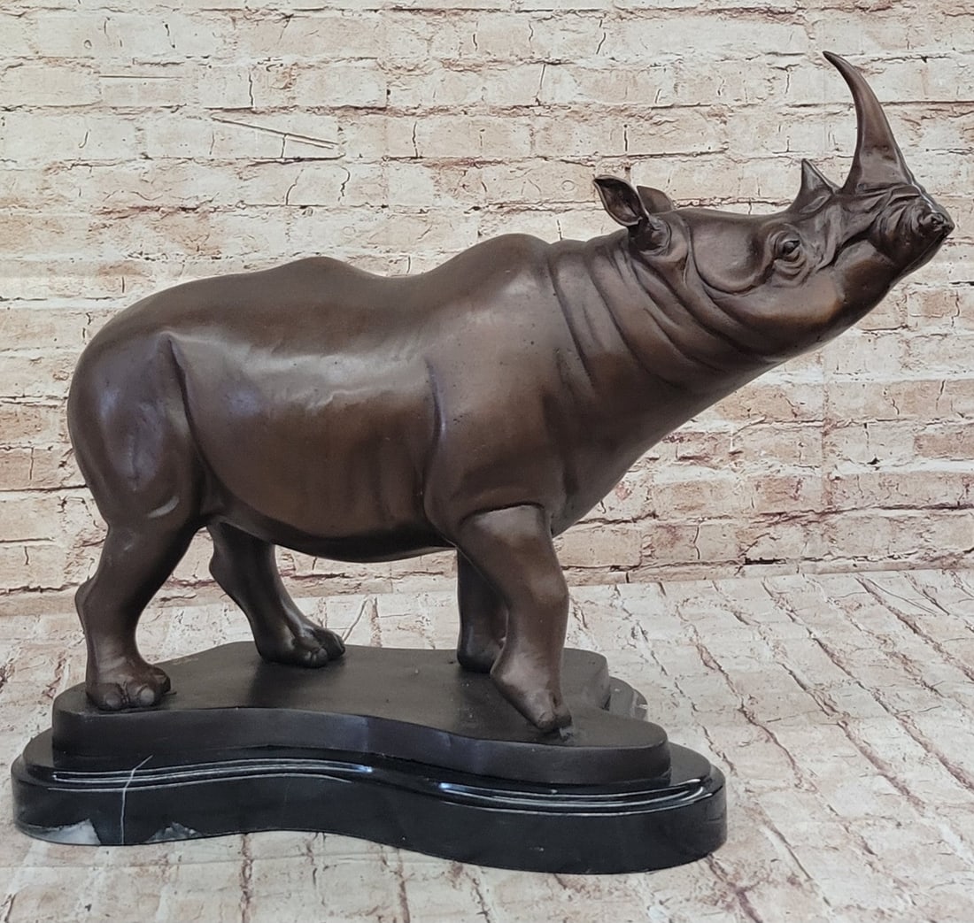 Limited Edition Hand Made Bronze White Rhino Sculpture: Wildlife Statue Figure: Condition: This sculpture is in perfect condition. Bronze Dimensions with Marble Base: Height 17" X Width 22" Marble Dimensions: Diameter 16.5" Height without base:16" Weight:40 LBS Inventory:85585522