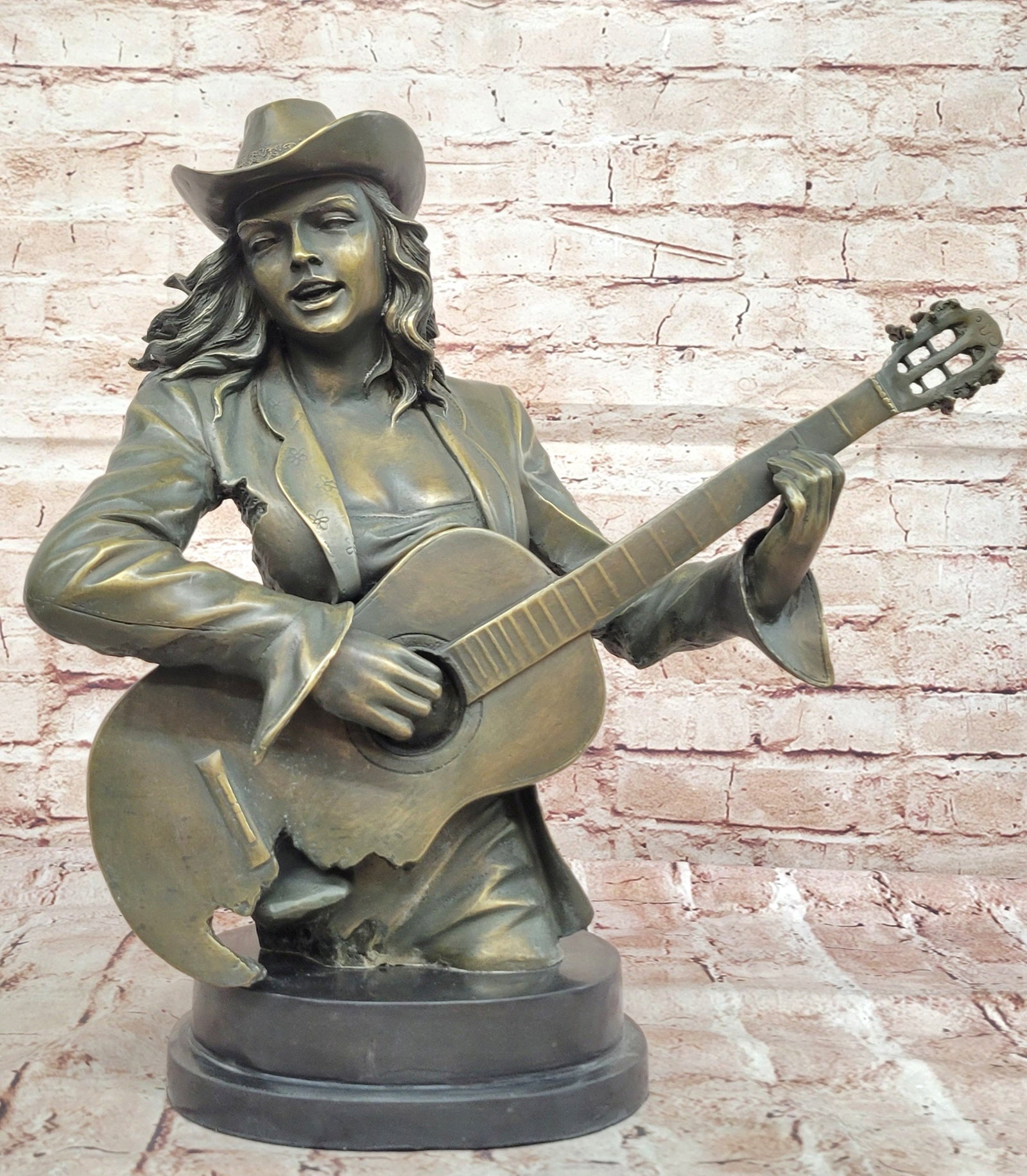 Bronze Cowgirl Guitarist Bust Sculpture Signed Williams Music Lover Western Decor Figurine: Condition: This sculpture is in perfect condition. Bronze Dimensions with Marble Base: Height 16" X Width 15.5" Marble Dimensions: Diameter 7" Height without base:14" Weight:24 LBS Inventory:43GTM1891