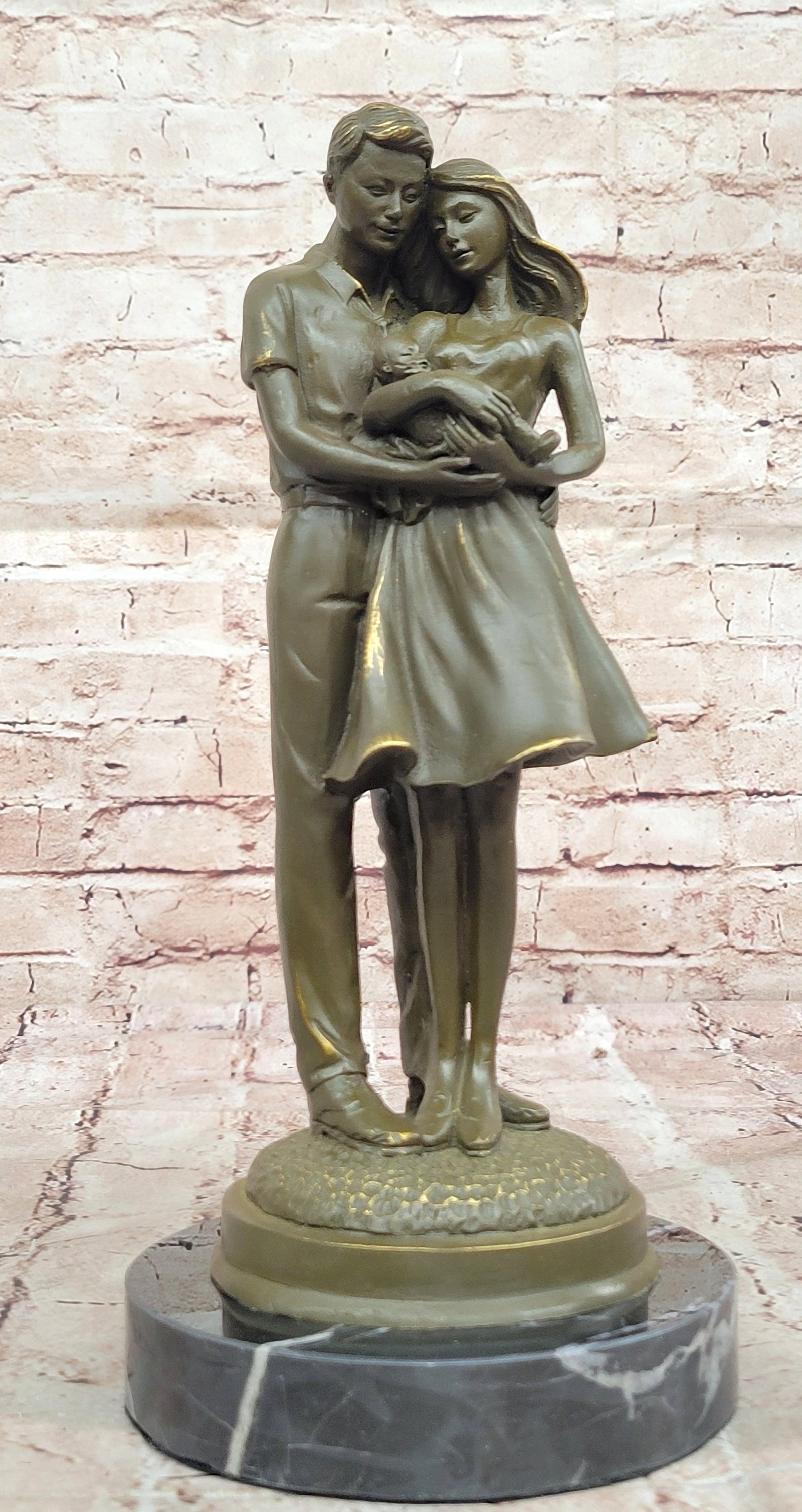 Bronze Family Sculpture by Milo Parents Holding Baby Statue Newborn Celebration Art: Condition: This sculpture is in perfect condition. Bronze Dimensions with Marble Base: Height 13" X Width 6" Marble Dimensions: Diameter 6" Height without base:12" Weight:7 LBS Inventory:31GTS4186513 