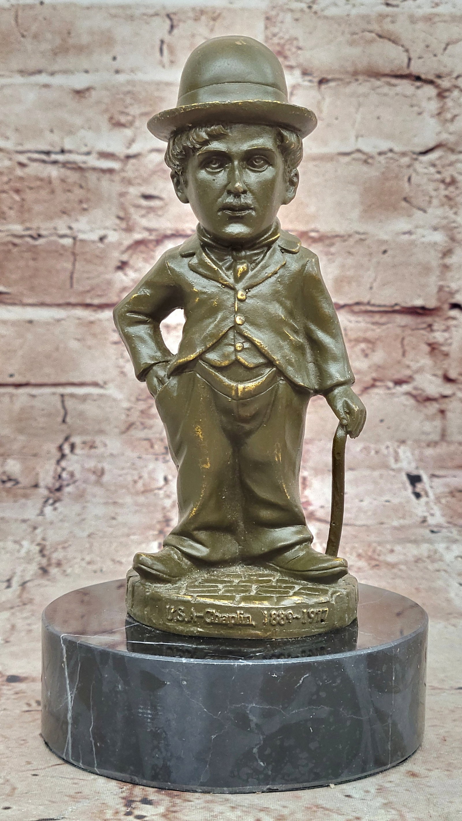 Fisher Signed Charlie Chaplin Sculpture ? Bronze Statue Hollywood Collectible: Condition: This sculpture is in perfect condition. Bronze Dimensions with Marble Base: Height 8" x Width 4" Marble Dimensions: Diameter 4" Height without base:6.5" Weight:3 LBS Inventory:62GTS5123926 