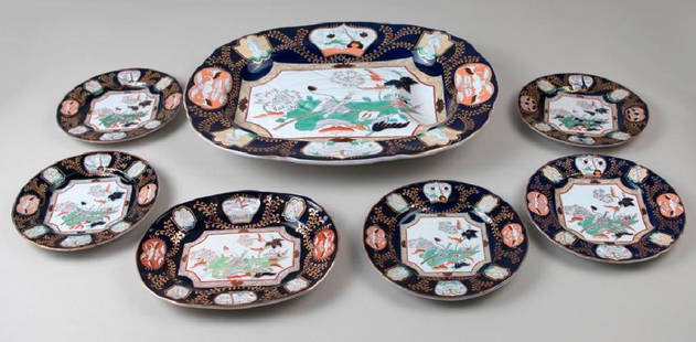 Mason's Ironstone Imari Lot: Mason's Imari pattern ironstone lot of 7 pieces. One large platter (chip on back) 20-1/2" x 16". One small platter 11" x 8-5/8". 5 plates 8-5/*(one with small chip).