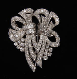 Platinum and Diamond Sweater Clips Pin Combination: Very fine 152 diamonds set in platinum, high quality, hand fabricated sweater clips and brooch combination, circa 1940. Separates into 2 sweater clips. Aprox 152 diamonds. 5 carats total weight. 62 fu