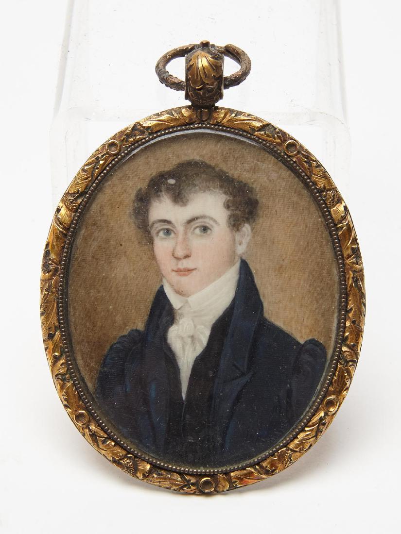 Miniature Portrait of a Man: Miniature Portrait of a Man in the original locket with reverse window, containing braided hair. American, circa 1835. H 3".