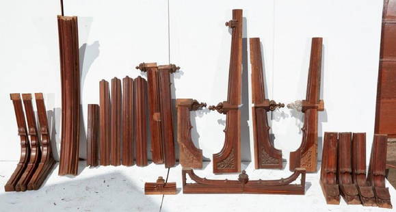 Brewster Mansion-Wooden Ceiling Architectural Elements: Brewster Mansion-Ceiling Architectural Elements. Approximately 28 pieces including arch moldings. Appears to be to be walnut or tropical wood. Preview inspection for Brewster Architectural Elements by