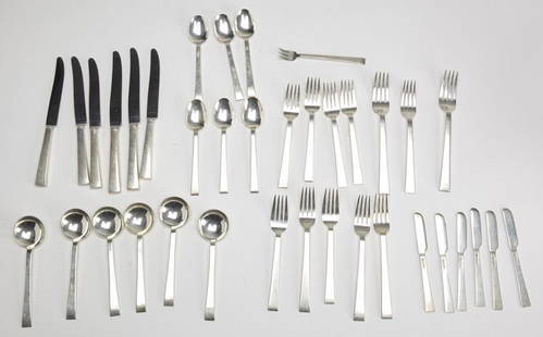 Modern Sterling Flatware Set: Modern Sterling Flatware Set stamped R, 6 forks (2 larger and 4 slightly smaller), 6 salad forks, 6 teaspoons, 6 soup spoons, 6 butter knives, 1 pickle fork, 6 knives with sterling handles and