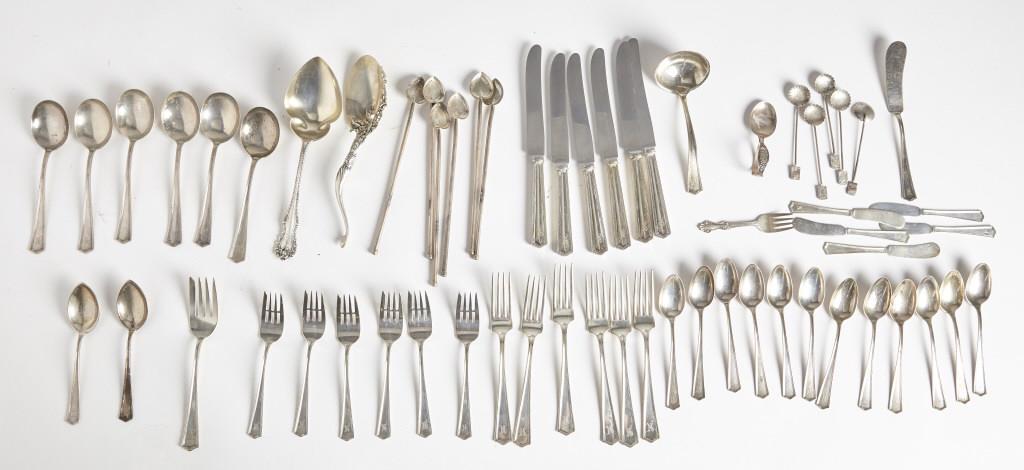 Lot of Mixed Sterling Utensils: Sterling, lot of matching flatware including 6 large soup spoons, 6 forks, 6 salad forks 12 teaspoons, 2 serving spoons, 5 butter knives and one butter spreader, 1 ladle, 1 serving fork. Plus unmatche