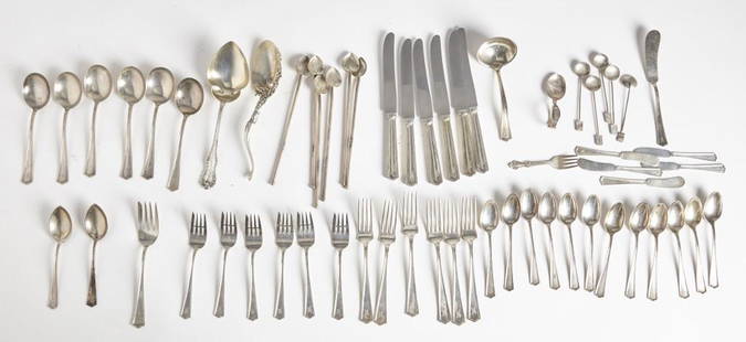 Lot of Mixed Sterling Utensils: Sterling, lot of matching flatware including 6 large soup spoons, 6 forks, 6 salad forks 12 teaspoons, 2 serving spoons, 5 butter knives and one butter spreader, 1 ladle, 1 serving fork. Plus