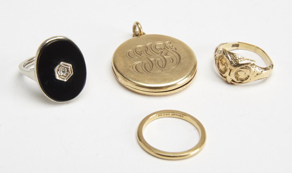 Three 14K -18K Gold Ladies Rings and Locket: 14K Victorian Owl Ring .125ozt, 14K Ring with onyx and diamond .125 ozt, 18K Gold Band .065 ozt, 14K Locket .270 ozt, Total weight .570 ozt.