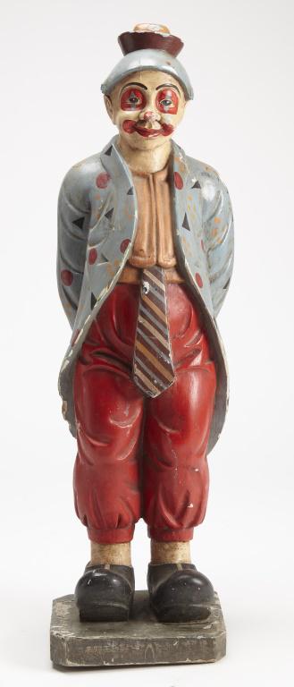 Carved Circus Clown Trade Figure: Rare Carved Circus Clown trade figure, circa 1920. Carved wood with an old painted surface. Family history states that this figure originated from a Missouri circus and was positioned at the entrance 