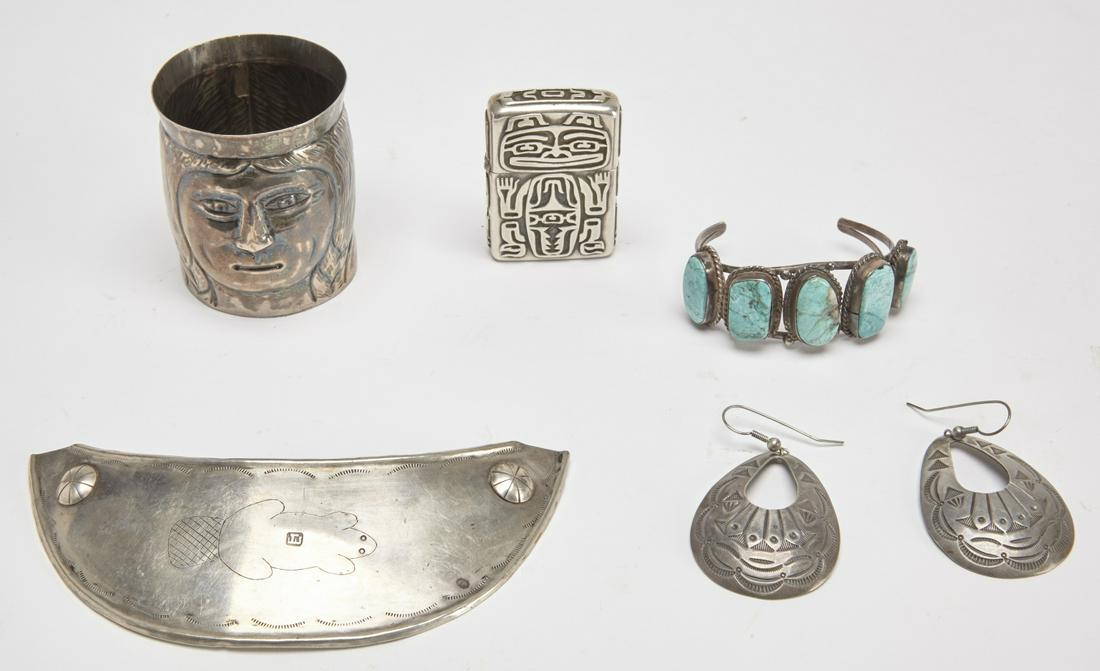 Five Native American Silver Items: Five Native American silver Items including a silver bracelet with turquoise stones. Zippo sterling lighter with Native motif. Pr silver earrings unmarked. Unusual old silver collar with engraved beav