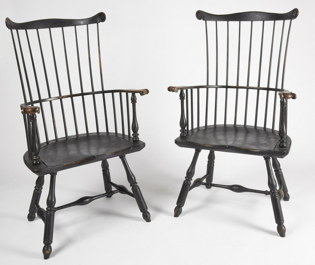 Fine Pair of Repro Windsor Arm Chairs: Fine pair of repro Windsor arm chairs with carved ears and knuckle arms. Painted black to look old. H 44-1/2". Seat Height 17-1/2", Overall width: 24-5/8". Excellent condition.
