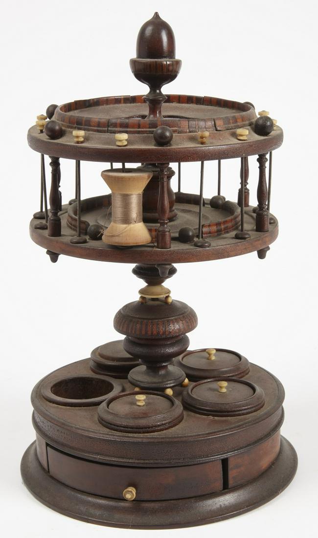 Very Fine Sewing Spool Holder: Very fine sewing 19th century spool holder with egg corn turned finial and drawer. Turned and carved wood with bone. Drawer with poplar and mahogany secondary wood. Square nail construction. H 15-1/2"