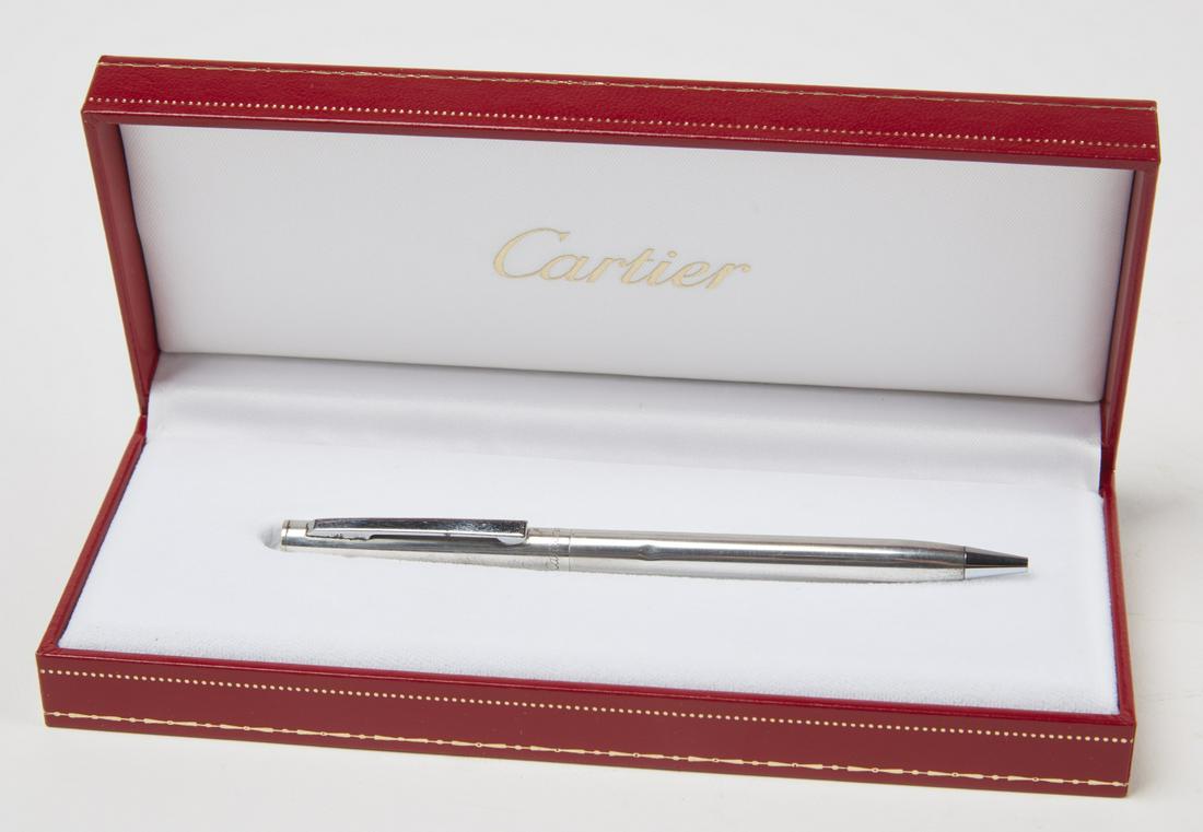 Cartier Sterling Pen with Original Box: Cartier sterling pen with original box. Box; H 1-1/4",L 7-1/8", D 3". Very small dimple dent on barrel.