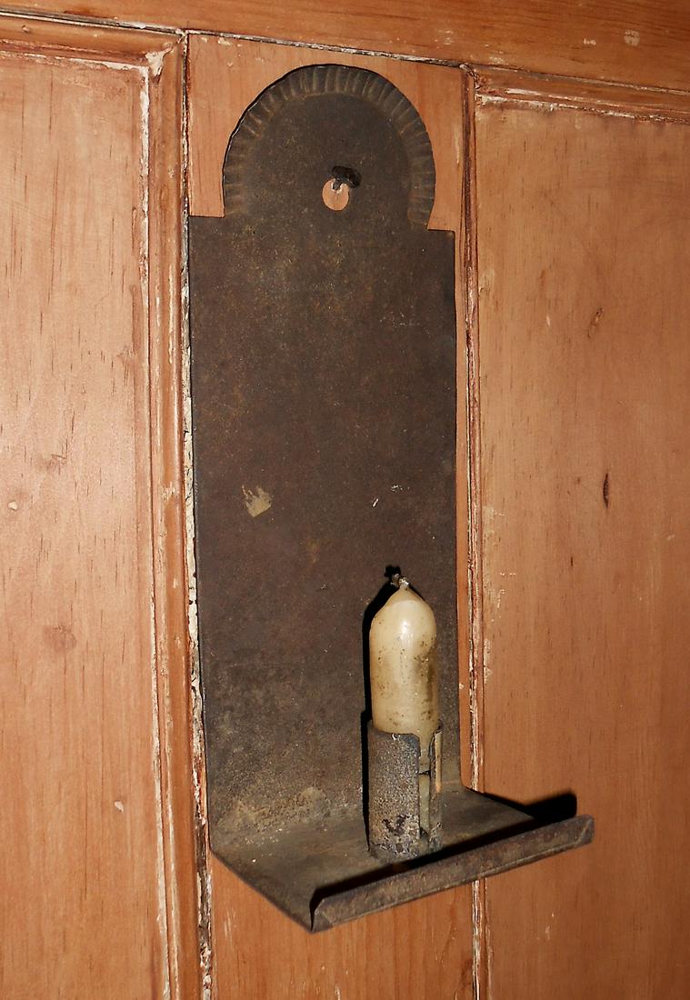 Early Tin Sconce: 19th Century American tin sconce with crimped tombstone form top and clinched candle cup, retaining its worn, original patina and pure simplicity. It is 10" high , 4" wide. US shipping $20 Courtesy of