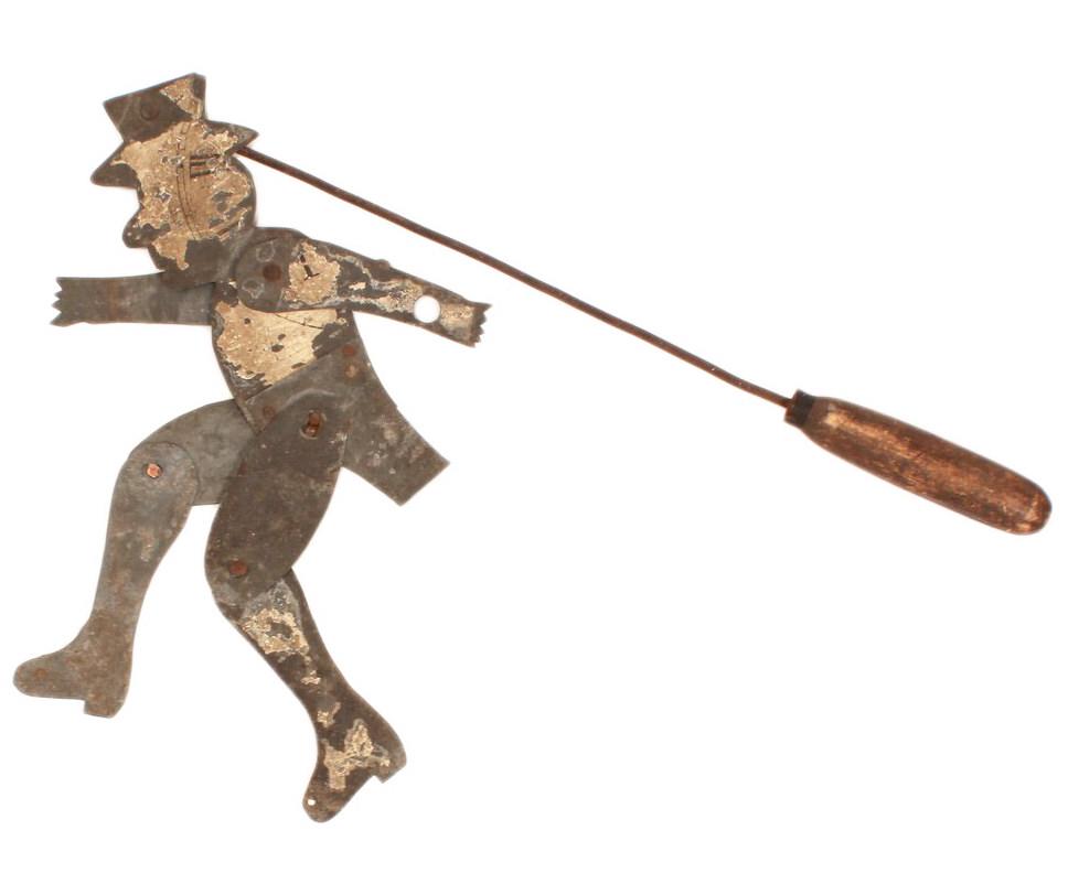 Folk Art Tin Dancing Man Toy: Folk art toy jointed puppet made of repurposed tin clock faces, c. late 19th century Folk art tin puppet of a top-hatted man with jointed limbs, c. late 19th century. Homemade toys of this kind are al