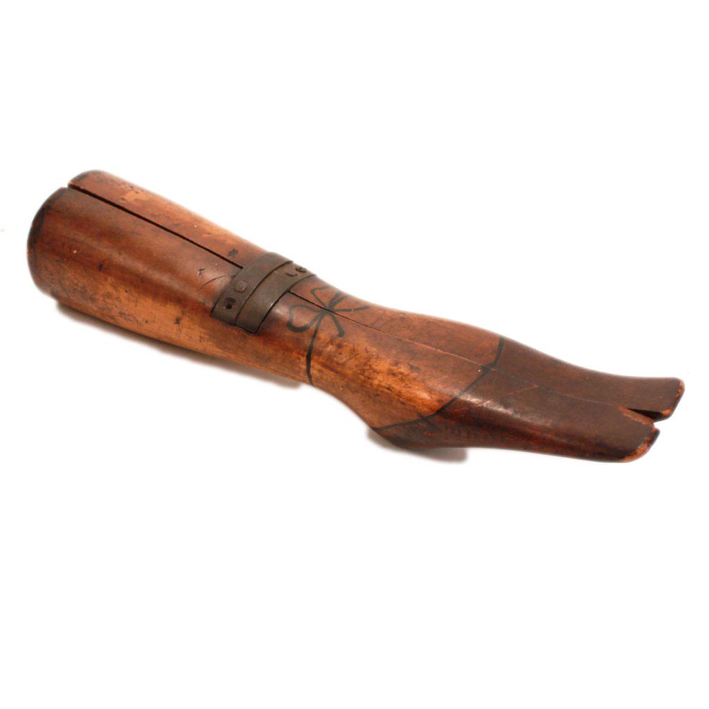 Folk Art Ladies Stockinged Legs Boot Jack: Folk art ladies boot jack taking the shape of stockinged legs, c. late 19th century. Unusual Folk art hand-carved and painted boot jack in the form of lady legs, c. 1890s. Used to aid in the removal o