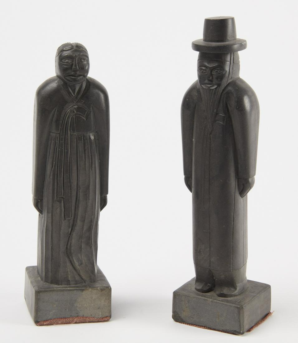 Pair of Black Stone Figurers (1 of 2)