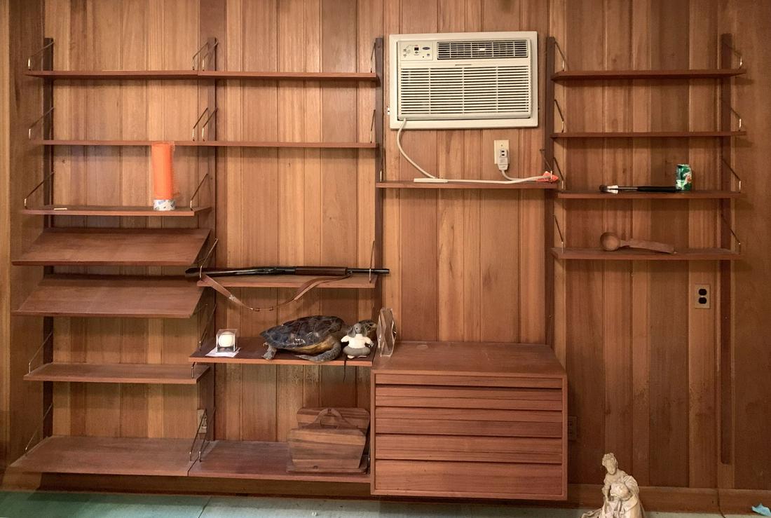 Danish Modern Wall Unit by Poul Cadovius: Danish Modern wall unit by Poul Cadovius. Not signed. Cabinet H 20-3/8" x L 31-1/2" x D 15-3/4", 5 vertical supports H 77-7/8", 18 shelves L 31-1/2" x D 7-7/8", 3 shelves L 31-1/2" x D 9-1/2", 3 shelv