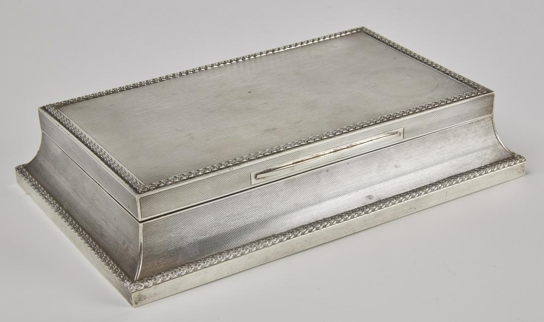Asprey Silver Cigar Box: Fine high quality Asprey silver cigar box. Finely tooled surface detail. Circa 1925.Wood lined with leather bottom. Dividers are missing. Touch marks on lid and box edge. Excellent condition, a couple