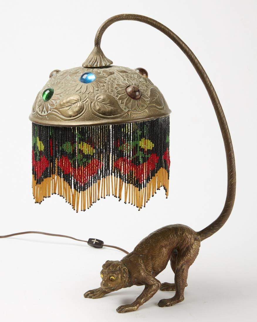Brass Lamp with Monkey: Interesting brass lamp with monkey. Monkey's tail holds the shade. Circa 1930. H 21".Excellent condition.