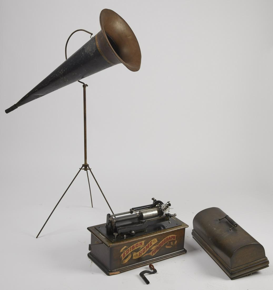 Victrola: Victrola with horn and stand. Also included many cylinder rolls. H 32-1/2", Dia 13".