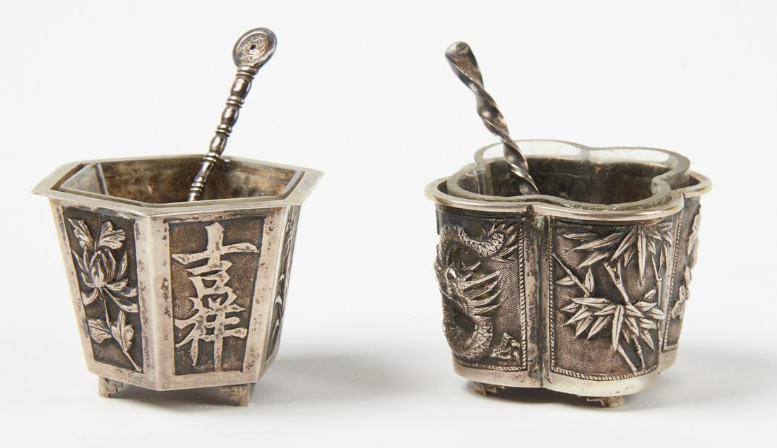 Two Antique Silver Chinese Cups with gall inserts: Two signed antique silver Chinese footed cups with blown glass inserts. H each 1-5/8". Please refer to this link for high-res images. https://www.dropbox.com/sh/sy7jx8wm28iqcl3/AADQaBXZubgrPRDDd6-J2Q9