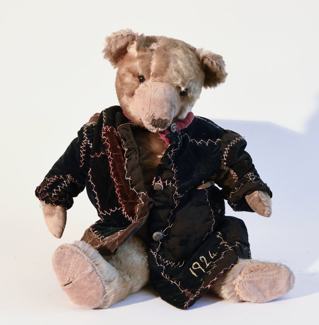 Bear with Crazy Quilt Coat: Large antique Teddy Bear with his. original crazy quilt coat. Minor imperfections. H 21-1/2".