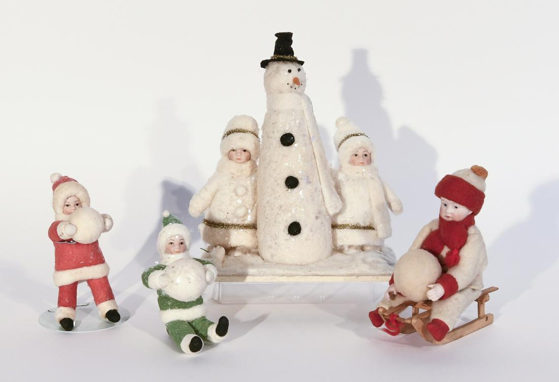Lot of 4 Christmas Ornaments and Candy Container: Lot of 4 vintage Christmas ornaments. One a candy container. Dolls have bisque heads. Items range in size. The overall height of the snowman is approx. 9"