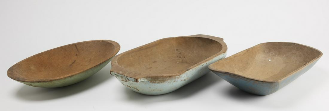 Three Early American Painted Wooden Trenchers: Three early American painted trenchers. 19th century. Excellent condition. Largest: H 3-3/4", L 20-5/8", D 10-3/4". Medium: H 3-1/2", L 18-1/2", D 9-7/8". Smallest: H 3-1/2", L 18-1/8", D 9-7/8".