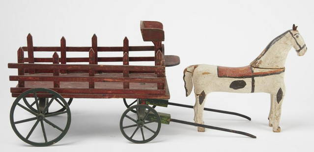 Folk Art Horse and Wagon Toy: Folk art horse and wagon toy. Carved wood with original paint. American, circa 1920. OA L 30". Length of horse 13-1/4" W 9-1/8". Condition is consistent with age. One arm of the wagon (Breeching Dee)