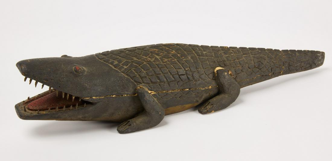 Folk Art Carved Gator Fish with Teeth: Folk art carved and painted gator. Beautiful original surface. Found in Georgia, circa 1900. W 22-1/2" D 4-1/2"H 4-7/8" Condition: Fine original condition. Inspected under UV light. No restoration not